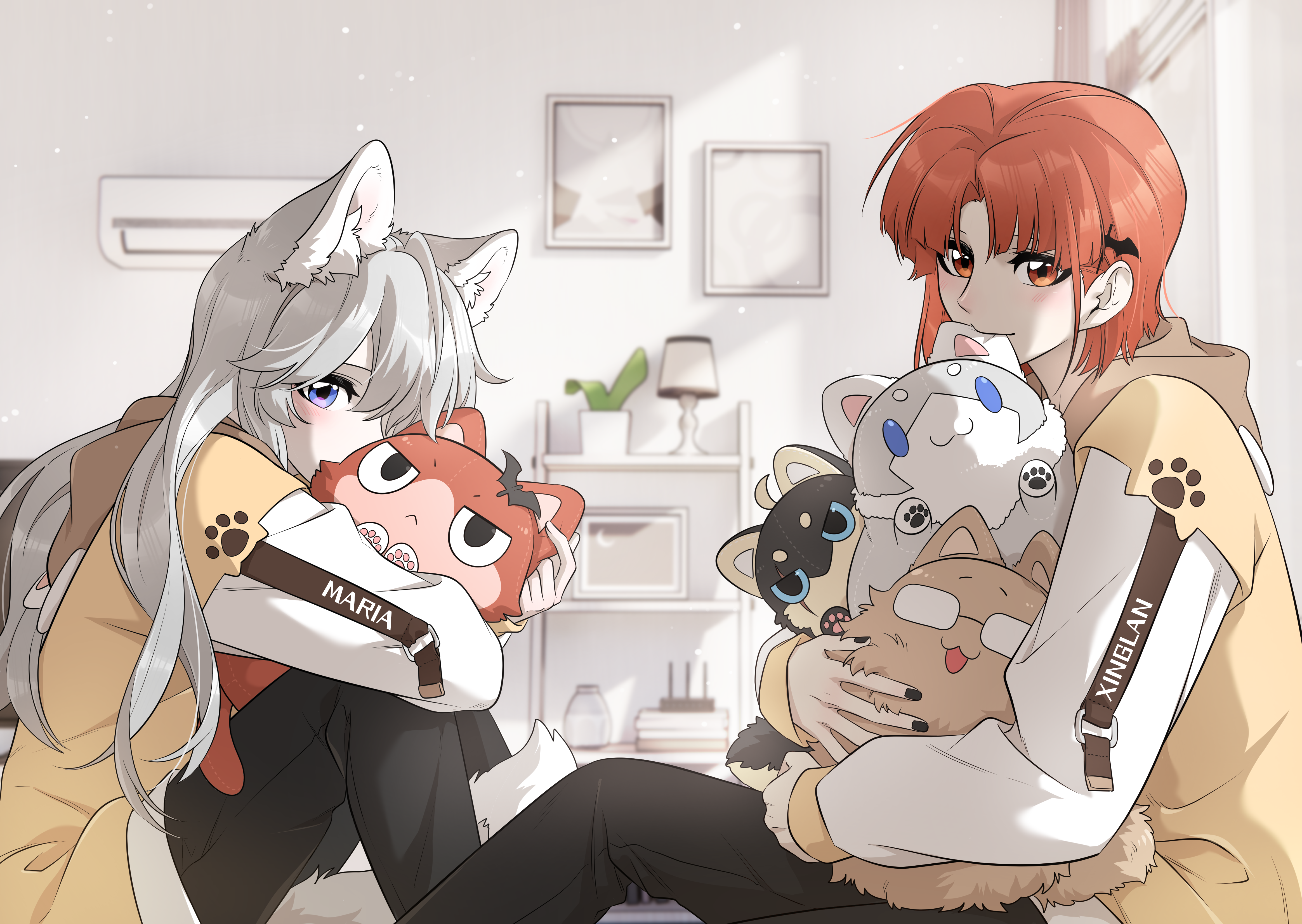 Maria and Xing Lan on the sofa with plush toys