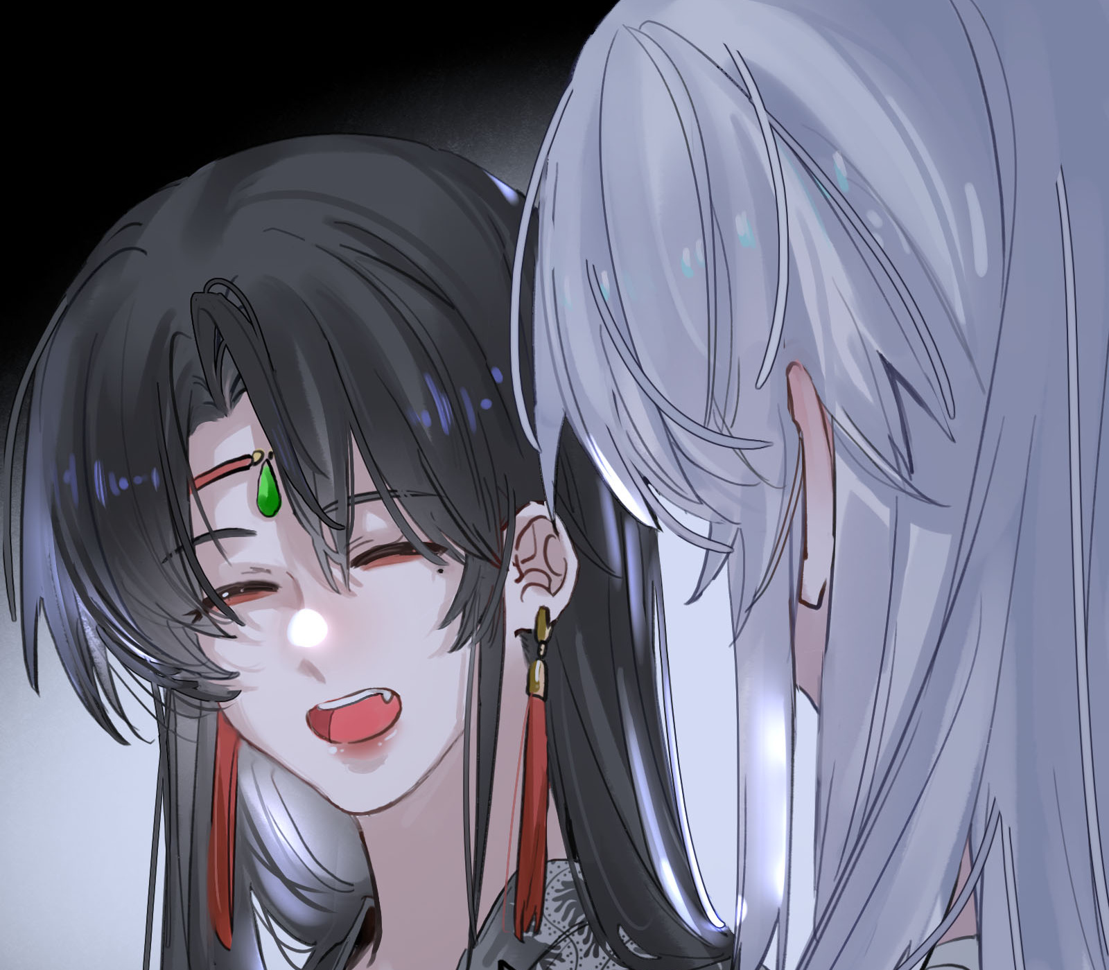 Two women share a close moment in blue light.