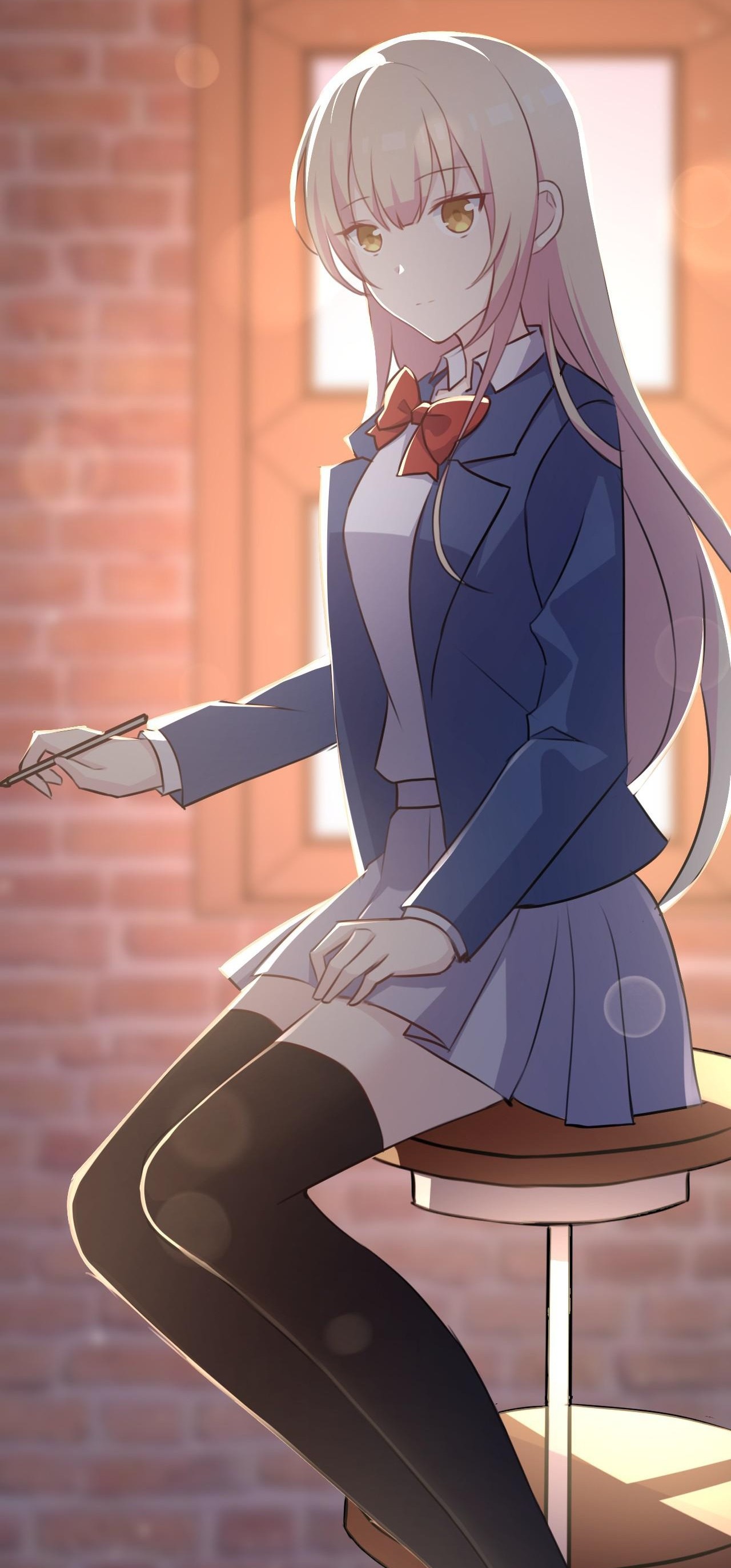 Xinghuo in a school blazer on a stool by a brick wall, brush in hand