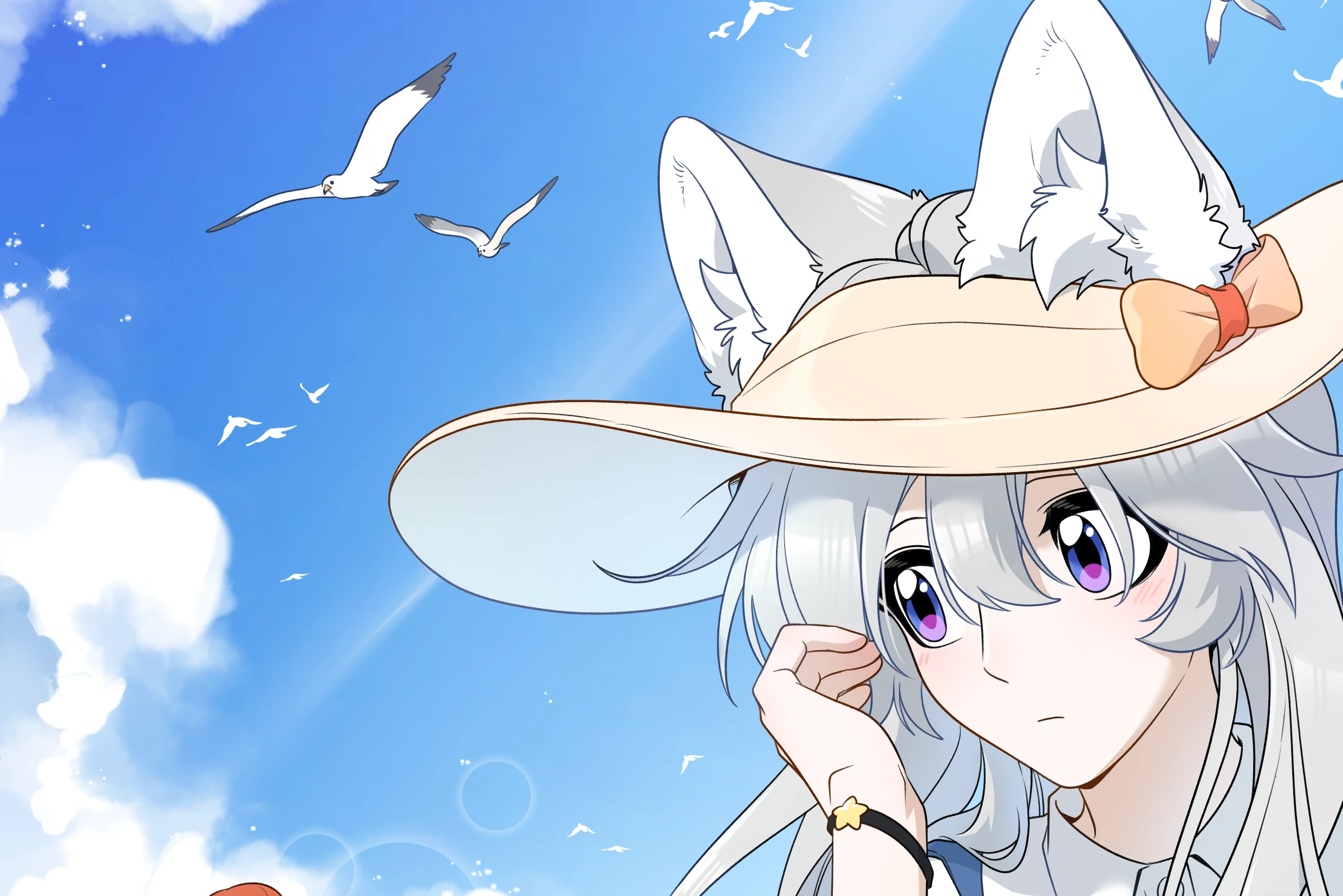 Xing Lan in a sun hat on the beach