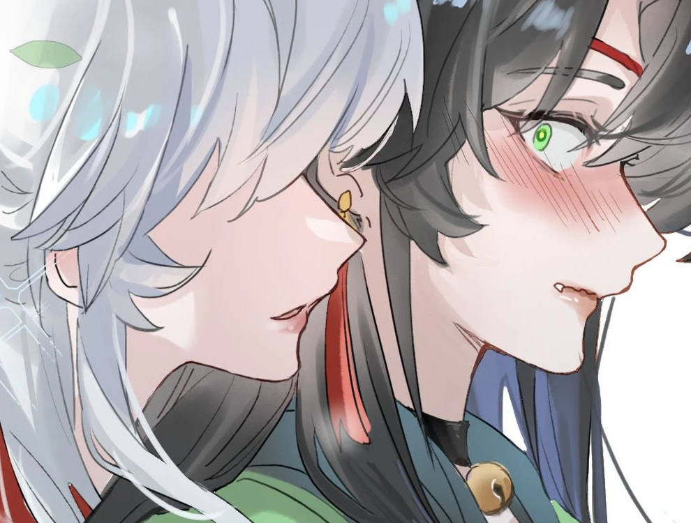 The two leads cheek to cheek, one of them blushing